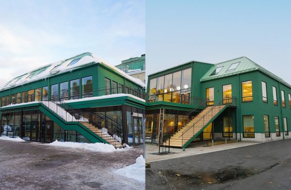 Två gröna hus med två våningar. Trappor utvändigt till båda husen.